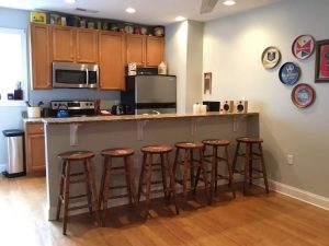 JackTown Loft interior wooden cabinets stools and flooring