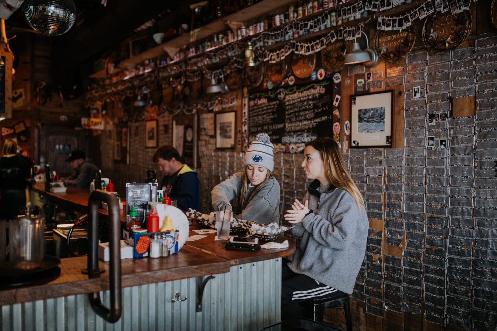 People eating at a bar downtown