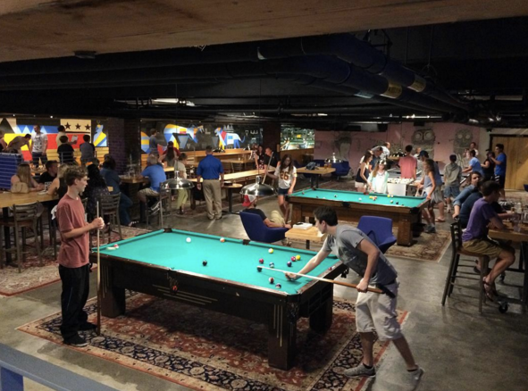 People playing pool