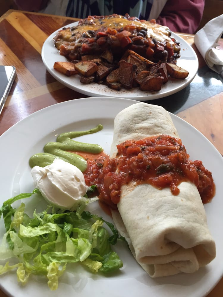 Breakfast burrito and potato wedges brunch local restaurant 