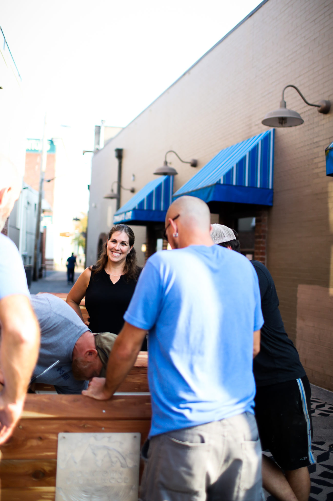 Happy people volunteering outside