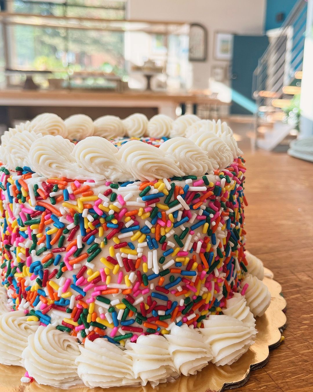 Cake covered in rainbow sprinkles